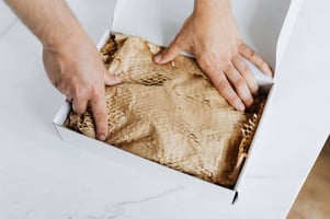 Box with belongings that are wrapped