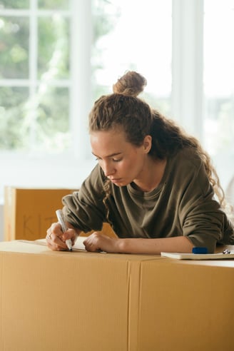 Woman packing items